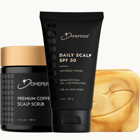 Domepeace Daily Scalp SPF 50 tube in the center, flanked by a jar of Premium Coffee Scalp Scrub on the left and a gold-colored bar of soap on the right, all on a light off-white background.